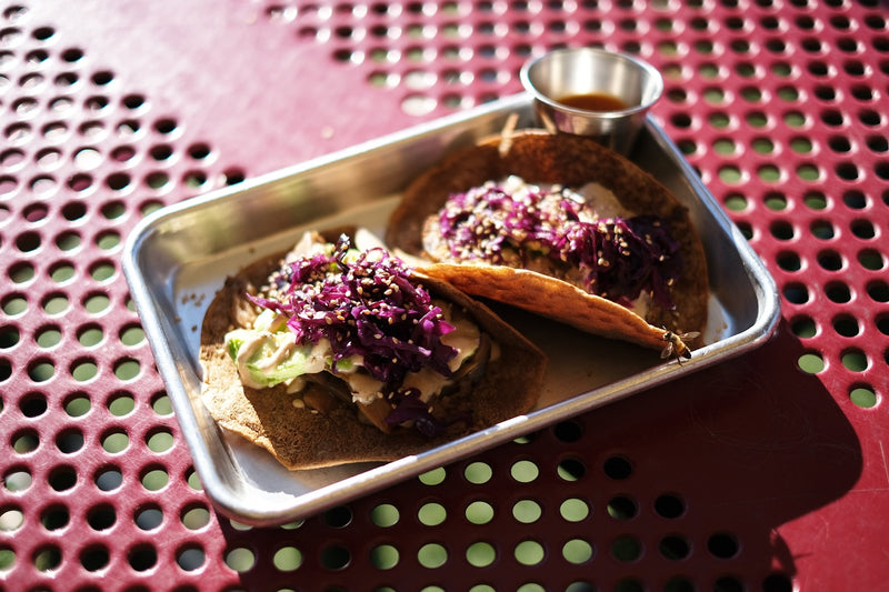 Two tacos with purple toppings on a metal tray on a red perforated table. atxfoodco
When the bees 🐝✨show up, we know it’s nature-approved.
Sunlight in every bite.
Bees just wanna have fun and they get hungry, too! 🐝
So we feed them whenever they arrive.
It’s Friday—go play.
If you get hungry and you’re nearby, we’ll be here 😋