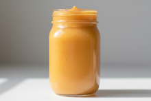 Organic wildcrafted sea moss gel in glass jar - creamy mango colored wildcrafted seamoss gel